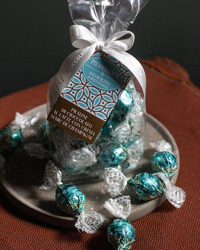 Sorrisi Cioccolato Piemondor Milchschoko Pralinen mit Marc de Champagne Creme 200g